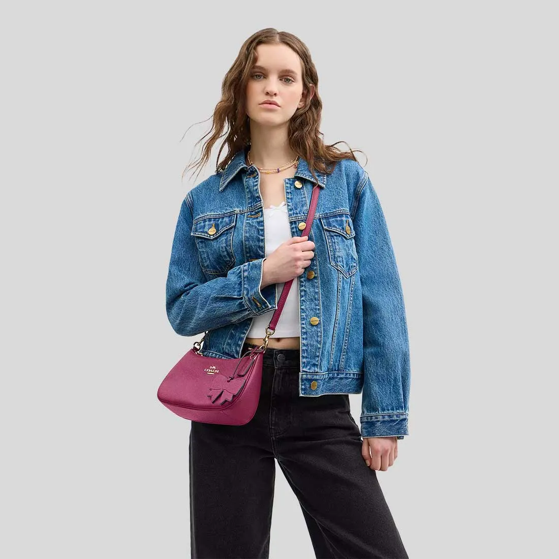 Sac à bandoulière COACH Teri avec charme en nœud rose CY654