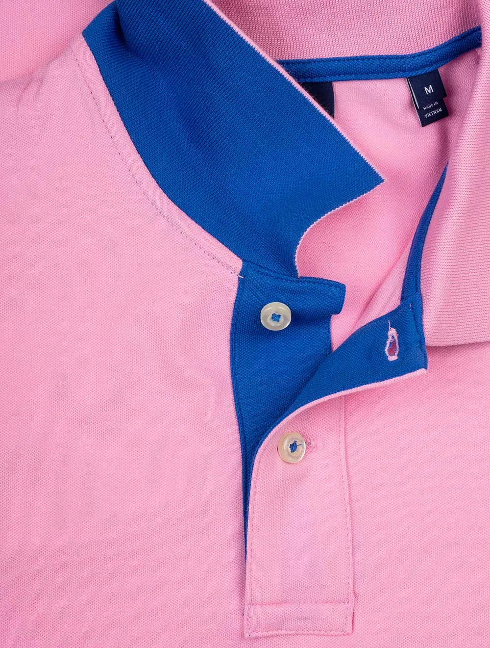Polo à col contrasté piqué rose vif