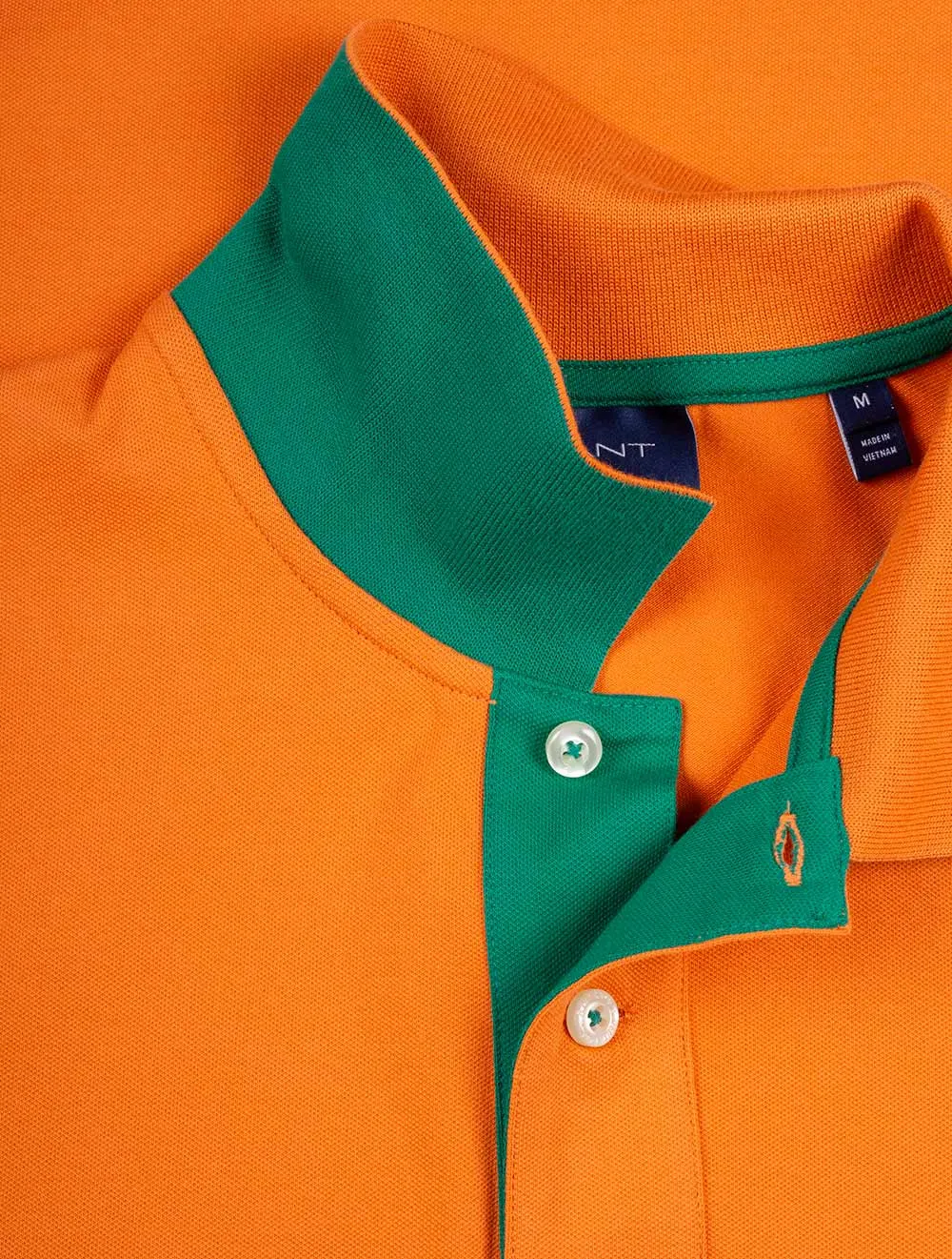 Polo à col contrasté en piqué Orange Citrouille