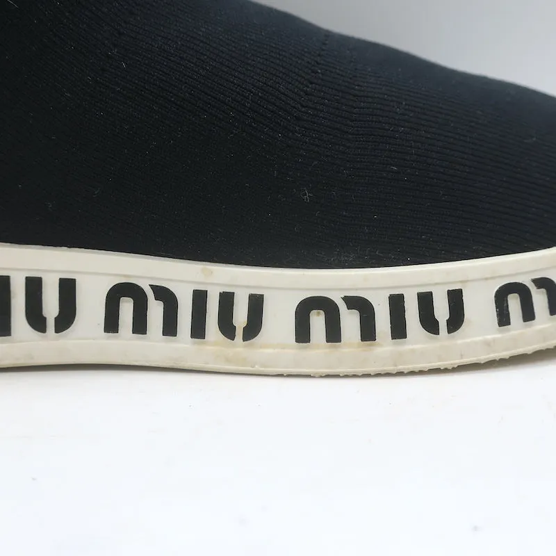 Baskets Miu Miu à logo avec chaussettes intégrées en maille extensible noire taille 38