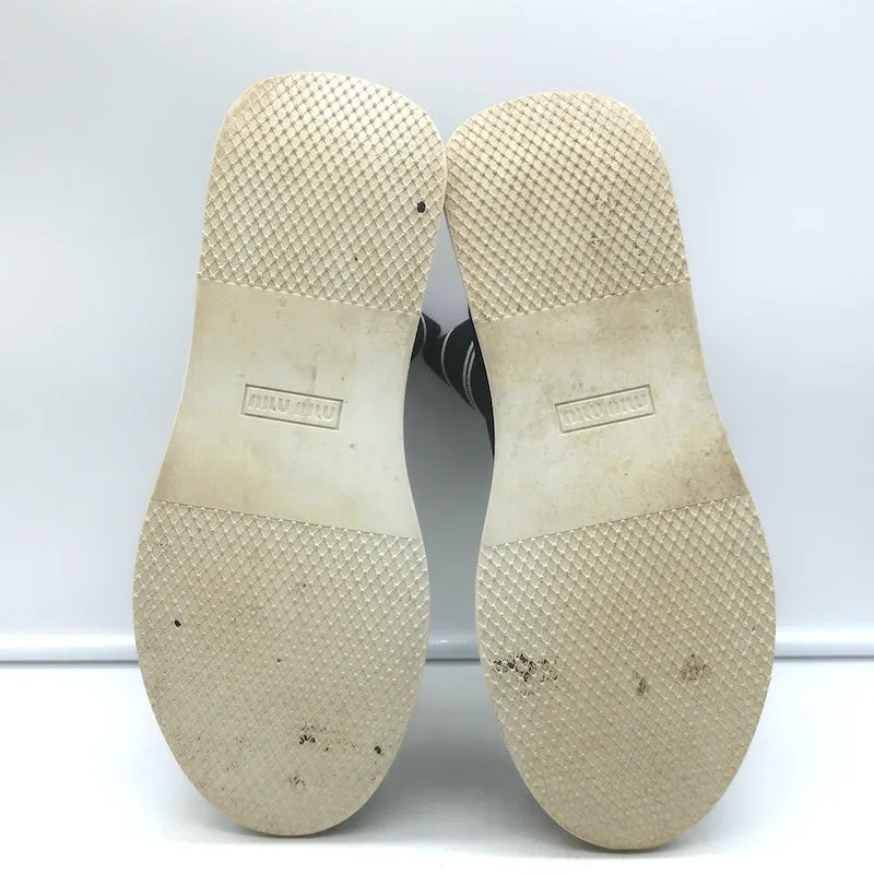 Baskets Miu Miu à logo avec chaussettes intégrées en maille extensible noire taille 38