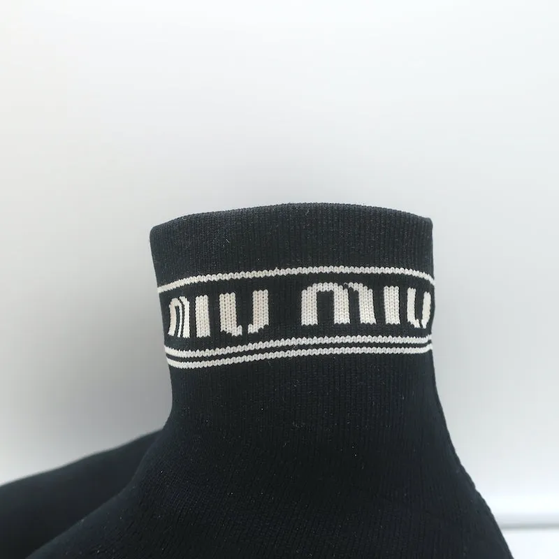 Baskets Miu Miu à logo avec chaussettes intégrées en maille extensible noire taille 38