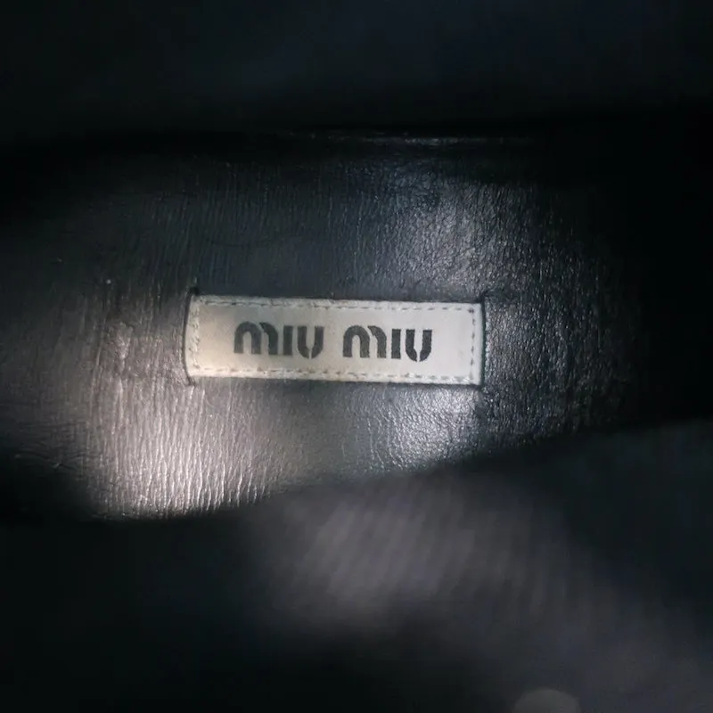 Baskets Miu Miu à logo avec chaussettes intégrées en maille extensible noire taille 38