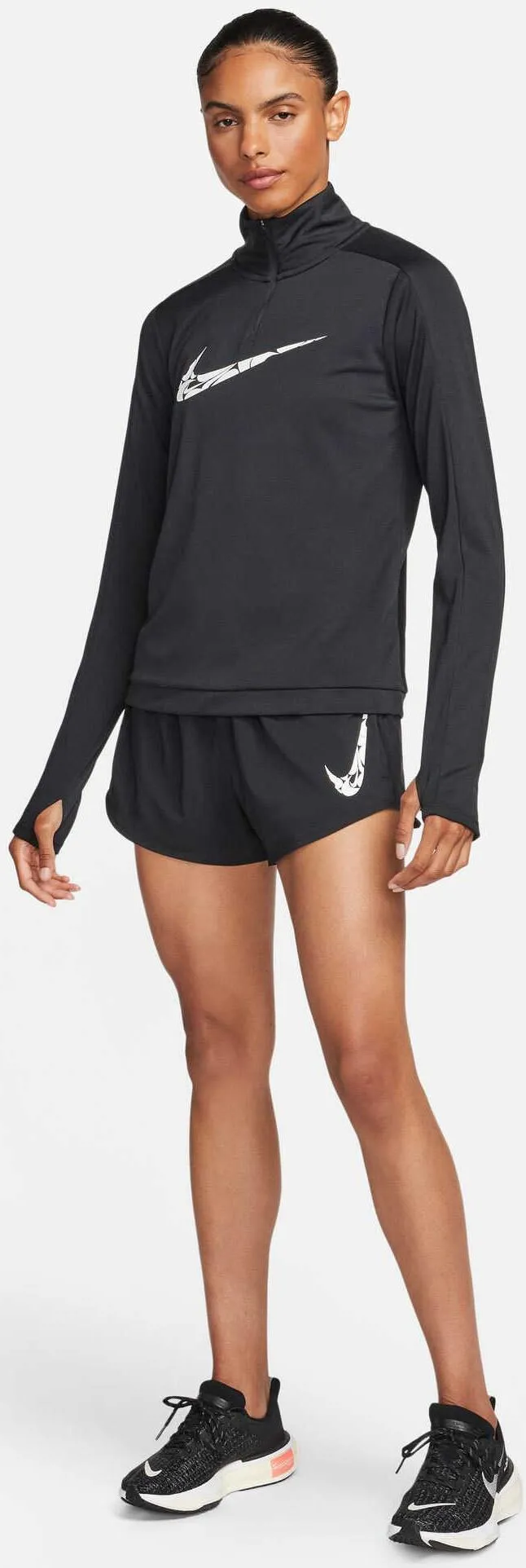Shorty de course à taille moyenne avec doublure brief et logo Swoosh pour femme